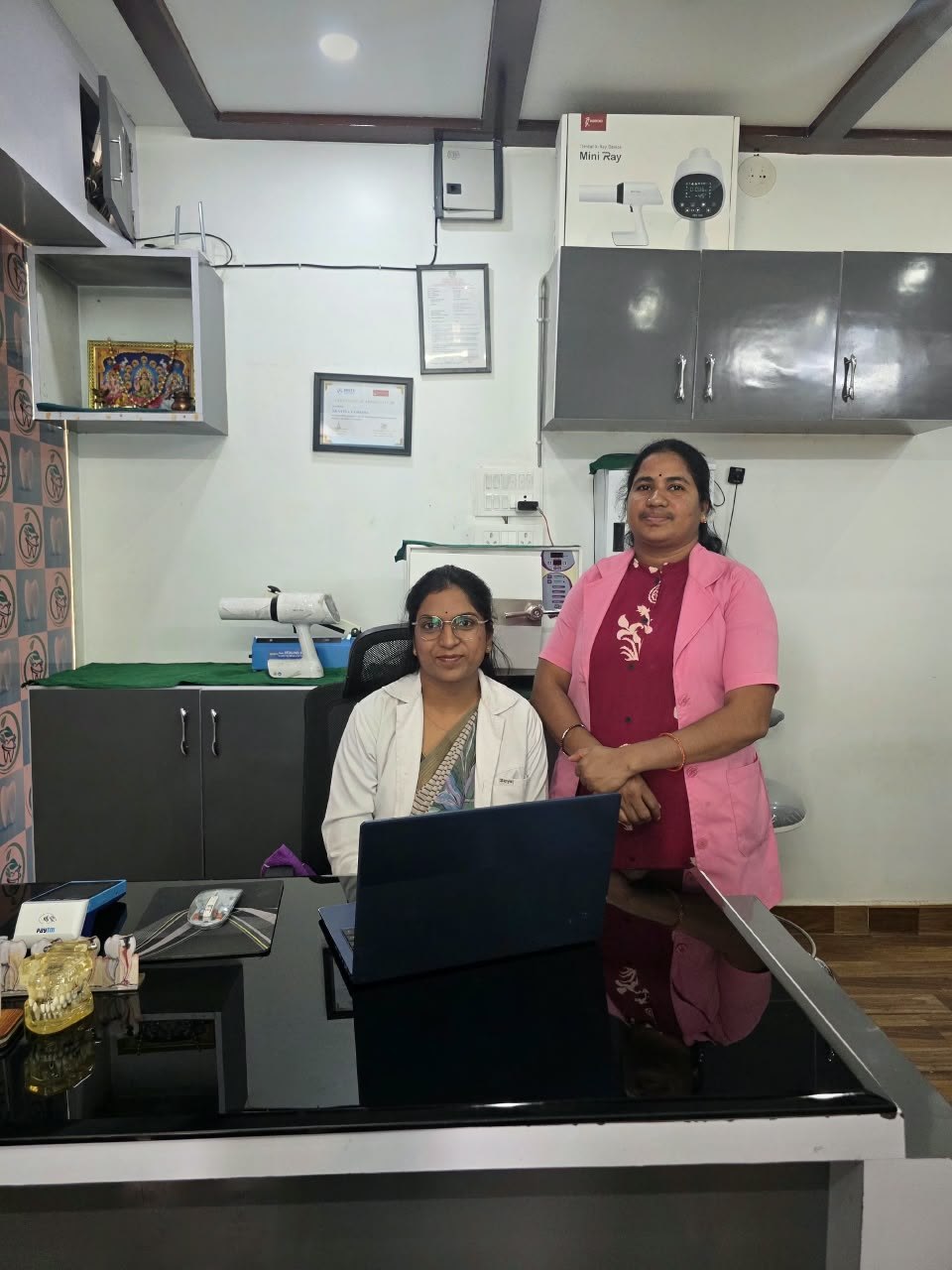 Dr. Vandana Vytla with a clinic team member